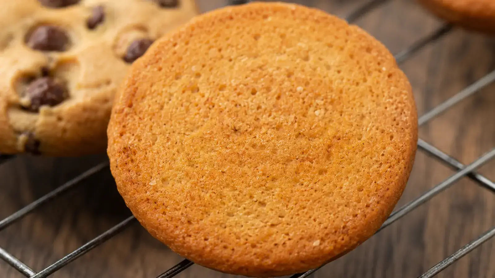 Close-up of the bottom of a perfectly baked cookie showing even golden-brown color with no dark spots